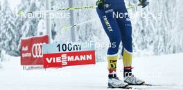 30.11.2014, Ruka, Finland (FIN):  athlete's feet and banners - FIS world cup cross-country, 10km women, Ruka (FIN). www.nordicfocus.com. © Felgenhauer/NordicFocus. Every downloaded picture is fee-liable.