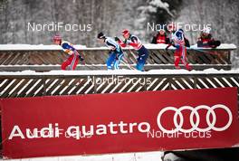05.12.2014, Lillehammer, Norway (NOR): athletes pass by an Audi banner - FIS world cup cross-country, individual sprint, Lillehammer (NOR). www.nordicfocus.com. © Felgenhauer/NordicFocus. Every downloaded picture is fee-liable.