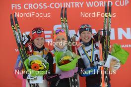 13.12.2014, Davos, Switzerland (SUI): Marit Bjoergen (NOR), Therese Johaug (NOR), Kerttu Niskanen (FIN) (l-r) - FIS world cup cross-country, 10km women, Davos (SUI). www.nordicfocus.com. © Rauschendorfer/NordicFocus. Every downloaded picture is fee-liable.