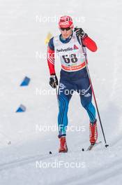 13.12.2014, Davos, Switzerland (SUI): Evgeniy Belov (RUS)  - FIS world cup cross-country, 15km men, Davos (SUI). www.nordicfocus.com. © Rauschendorfer/NordicFocus. Every downloaded picture is fee-liable.