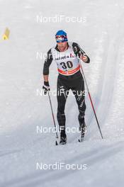 13.12.2014, Davos, Switzerland (SUI):  Curdin Perl (SUI) - FIS world cup cross-country, 15km men, Davos (SUI). www.nordicfocus.com. © Rauschendorfer/NordicFocus. Every downloaded picture is fee-liable.