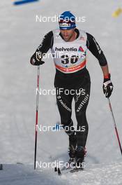 13.12.2014, Davos, Switzerland (SUI): Curdin Perl (SUI) - FIS world cup cross-country, 15km men, Davos (SUI). www.nordicfocus.com. © Rauschendorfer/NordicFocus. Every downloaded picture is fee-liable.