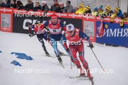14.12.2014, Davos, Switzerland (SUI): Quarterfinals: Andrew Newell (USA), Alexey Petukhov (RUS), Eirik Brandsdal (NOR), (l-r) - FIS world cup cross-country, individual sprint, Davos (SUI). www.nordicfocus.com. © Rauschendorfer/NordicFocus. Every downloaded picture is fee-liable.