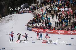 14.12.2014, Davos, Switzerland (SUI): Quarterfinals, athletes and spectators - FIS world cup cross-country, individual sprint, Davos (SUI). www.nordicfocus.com. © Rauschendorfer/NordicFocus. Every downloaded picture is fee-liable.