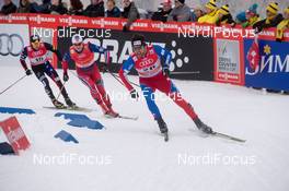 14.12.2014, Davos, Switzerland (SUI): Quarterfinals: Andrew Newell (USA), Eirik Brandsdal (NOR), Dusan Kozisek (CZE), (l-r) - FIS world cup cross-country, individual sprint, Davos (SUI). www.nordicfocus.com. © Rauschendorfer/NordicFocus. Every downloaded picture is fee-liable.