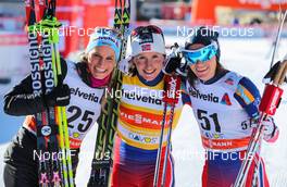 20.12.2014, Davos, Switzerland (SUI): (l-r) Nicole Fessel (GER), Rossignol, One Way, Alpina, Rottefella, Adidas, Marit Bjoergen (NOR), Fischer, Swix, Rottefella and Heidi Weng (NOR), Madshus, Swix, Rottefella - FIS world cup cross-country, 10km women, Davos (SUI). www.nordicfocus.com. © Laiho/NordicFocus. Every downloaded picture is fee-liable.
