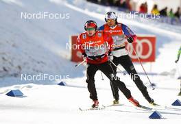 20.12.2014, Davos, Switzerland (SUI): Finn Haagen Krogh (NOR), Fischer, Swix, Alpina, Rottefella followed by Petter Northug (NOR), Fischer, Swix, Rottefella - FIS world cup cross-country, 15km men, Davos (SUI). www.nordicfocus.com. © Laiho/NordicFocus. Every downloaded picture is fee-liable.