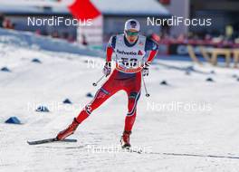 20.12.2014, Davos, Switzerland (SUI): Finn Haagen Krogh (NOR), Fischer, Swix, Alpina, Rottefella  - FIS world cup cross-country, 15km men, Davos (SUI). www.nordicfocus.com. © Laiho/NordicFocus. Every downloaded picture is fee-liable.