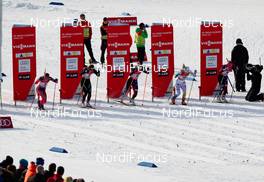 21.12.2014, Davos, Switzerland (SUI): (l-r) Ingvild Flugstad Oestberg (NOR), Madshus, Swix, Rottefella, Laurien van der Graaff (SUI), Rossignol, One Way, Rottefella, Odlo, Kikkan Randall (USA), Fischer, Yoko, Rottefella, Hanna Falk (SWE), Atomic, One Way, Alpina, Rottefella, Craft and Sophie Caldwell (USA), Fischer, Swix - FIS world cup cross-country, individual sprint, Davos (SUI). www.nordicfocus.com. © Laiho/NordicFocus. Every downloaded picture is fee-liable.