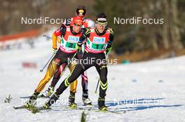 25.01.2014, Oberstdorf, Germany (GER): Francois Braud (FRA), Fischer, One Way, Rottefella followed by Johannes Rydzek (GER), Fischer, Swix, Rottefella, Adidas - FIS world cup nordic combined, team HS137/4x5km, Oberstdorf (GER). www.nordicfocus.com. © Laiho/NordicFocus. Every downloaded picture is fee-liable.