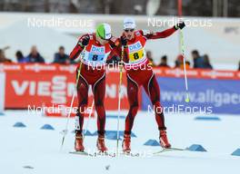 25.01.2014, Oberstdorf, Germany (GER): (l-r) Matic Plaznik (SLO), Fischer, One Way, Alpina, Odlo and Gasper Berlot (SLO)  - FIS world cup nordic combined, team HS137/4x5km, Oberstdorf (GER). www.nordicfocus.com. © Laiho/NordicFocus. Every downloaded picture is fee-liable.