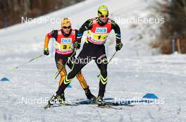 25.01.2014, Oberstdorf, Germany (GER): Sebastian Lacroix (FRA), Salomon, One Way followed by Fabian Riessle (GER), Fischer, One Way, Rottefella, Adidas - FIS world cup nordic combined, team HS137/4x5km, Oberstdorf (GER). www.nordicfocus.com. © Laiho/NordicFocus. Every downloaded picture is fee-liable.