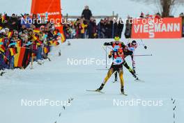 25.01.2014, Oberstdorf, Germany (GER): Eric Frenzel (GER), Fischer, Leki, Salomon, Adidas followed by Jason Lamy Chappuis (FRA), Salomon, Swix, One Way - FIS world cup nordic combined, team HS137/4x5km, Oberstdorf (GER). www.nordicfocus.com. © Laiho/NordicFocus. Every downloaded picture is fee-liable.