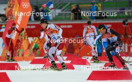 18.02.2014, Sochi, Russia (RUS): (l-r) Hideaki Nagai (JPN), Fischer, Swix, Rottefella and Taylor Fletcher (USA), Atomic, Swix - XXII. Olympic Winter Games Sochi 2014, nordic combined, individual gundersen HS140/10km, Sochi (RUS). www.nordicfocus.com. © NordicFocus. Every downloaded picture is fee-liable.