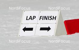 20.02.2014, Sochi, Russia (RUS): lap and finish sign - XXII. Olympic Winter Games Sochi 2014, nordic combined, team HS140/4x5km, Sochi (RUS). www.nordicfocus.com. © NordicFocus. Every downloaded picture is fee-liable.