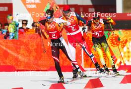 20.02.2014, Sochi, Russia (RUS): Lukas Klapfer (AUT), Salomon, Swix, Loeffler followed by Magnus Moan (NOR), Madshus, Rottefella, Swix and Eric Frenzel (GER), Fischer, Leki, Rottefella, Adidas - XXII. Olympic Winter Games Sochi 2014, nordic combined, team HS140/4x5km, Sochi (RUS). www.nordicfocus.com. © NordicFocus. Every downloaded picture is fee-liable.