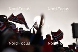 09.03.2014, Oslo, Norway (NOR): norwegian flags in the sunset - FIS world cup ski jumping, individual HS134, Oslo (NOR). www.nordicfocus.com. © Laiho/NordicFocus. Every downloaded picture is fee-liable.
