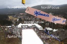 15.03.2014, Harrachov, Czech Republic (CZE): a flag flutters in the wind at the venue - FIS ski flying world championships, ski jumping, individual HS205, Harrachov (CZE). www.nordicfocus.com. © Domanski/NordicFocus. Every downloaded picture is fee-liable.