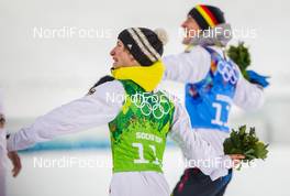 17.02.2014, Sochi, Russia (RUS): Marinus Kraus (GER) throwing the flowers - XXII. Olympic Winter Games Sochi 2014, ski jumping, team HS140, Sochi (RUS). www.nordicfocus.com. © NordicFocus. Every downloaded picture is fee-liable.