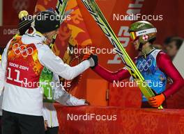 17.02.2014, Sochi, Russia (RUS): (l-r) Andreas Wank (GER) and Kamil Stoch (POL), Fischer - XXII. Olympic Winter Games Sochi 2014, ski jumping, team HS140, Sochi (RUS). www.nordicfocus.com. © NordicFocus. Every downloaded picture is fee-liable.