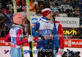 29.12.2014, Oberstdorf, Germany (GER): (l-r) Stefan Kraft (AUT), Fischer and Michael Hayboeck (AUT), Fischer - FIS world cup ski jumping, four hills tournament, individual HS137, Oberstdorf (GER). www.nordicfocus.com. © Laiho/NordicFocus. Every downloaded picture is fee-liable.