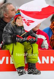 02.02.2014, Hinzenbach, Austria (AUT): a girl with austrian flag - FIS world cup ski jumping ladies, individual HS85, Hinzenbach (AUT). www.nordicfocus.com. © Laiho/NordicFocus. Every downloaded picture is fee-liable.