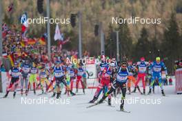 15.01.2015, Ruhpolding, Germany (GER): Simon Fourcade (FRA) leads the field at the start - IBU world cup biathlon, relay men, Ruhpolding (GER). www.nordicfocus.com. © Manzoni/NordicFocus. Every downloaded picture is fee-liable.