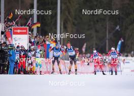 15.01.2015, Ruhpolding, Germany (GER): Simon Schempp (GER), Arnd Peiffer (GER), Johannes Thingnes Boe (NOR), Emil Hegle Svendsen (NOR) - IBU world cup biathlon, relay men, Ruhpolding (GER). www.nordicfocus.com. © Manzoni/NordicFocus. Every downloaded picture is fee-liable.