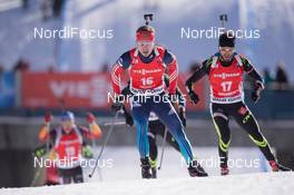 24.01.2015, Antholz, Italy (ITA): Timofey Lapshin (RUS), Jean Guillaume Beatrix (FRA) - IBU world cup biathlon, pursuit men, Antholz (ITA). www.nordicfocus.com. © Manzoni/NordicFocus. Every downloaded picture is fee-liable.