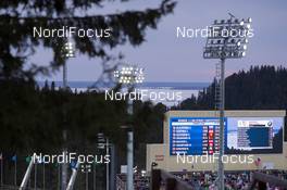 20.03.2015, Khanty-Mansiysk, Russia (RUS): Event Feature: Overview over the stadium with the video wall and the river in the back - IBU world cup biathlon, sprint women, Khanty-Mansiysk (RUS). www.nordicfocus.com. © Manzoni/NordicFocus. Every downloaded picture is fee-liable.