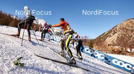 05.01.2015, Val Mustair, Switzerland (SUI): athletes and service men climb up the steep Coop hill - FIS world cup cross-country, tour de ski, training, Val Mustair (SUI). www.nordicfocus.com. © Felgenhauer/NordicFocus. Every downloaded picture is fee-liable.