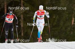 07.01.2015, Cortina-Toblach, Italy (ITA): Justyna Kowalczyk (POL), Sara Lindborg (SWE), (l-r)  - FIS world cup cross-country, tour de ski, 5km women, Cortina-Toblach (ITA). www.nordicfocus.com. © Felgenhauer/NordicFocus. Every downloaded picture is fee-liable.