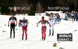 10.01.2015, Val di Fiemme, Italy (ITA): Dario Cologna (SUI), Martin Johnsrud Sundby (NOR), Petter Northug (NOR),  (l-r) - FIS world cup cross-country, tour de ski, mass men, Val di Fiemme (ITA). www.nordicfocus.com. © Felgenhauer/NordicFocus. Every downloaded picture is fee-liable.