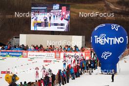 10.01.2015, Val di Fiemme, Italy (ITA):  the top group passes the stadium - FIS world cup cross-country, tour de ski, mass women, Val di Fiemme (ITA). www.nordicfocus.com. © Felgenhauer/NordicFocus. Every downloaded picture is fee-liable.