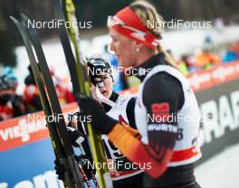 10.01.2015, Val di Fiemme, Italy (ITA): Nathalie Von Siebenthal (SUI), Denise Herrmann (GER), (l-r)  - FIS world cup cross-country, tour de ski, mass women, Val di Fiemme (ITA). www.nordicfocus.com. © Felgenhauer/NordicFocus. Every downloaded picture is fee-liable.