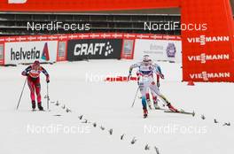 18.01.2015, Otepaeae, Estland (EST): (l-r) Ingvild Flugstad Oestberg (NOR), Madshus, Swix, Rottefella and Stina Nilsson (SWE), Fischer, Alpina, Craft - FIS world cup cross-country, team sprint, Otepaeae (EST). www.nordicfocus.com. © Laiho/NordicFocus. Every downloaded picture is fee-liable.