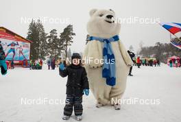 24.01.2015, Rybinsk, Russia (RUS): a young boy with a mascot - FIS world cup cross-country, individual sprint, Rybinsk (RUS). www.nordicfocus.com. © Laiho/NordicFocus. Every downloaded picture is fee-liable.