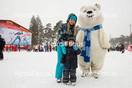 24.01.2015, Rybinsk, Russia (RUS): a young boy with his mother and a mascot - FIS world cup cross-country, individual sprint, Rybinsk (RUS). www.nordicfocus.com. © Laiho/NordicFocus. Every downloaded picture is fee-liable.
