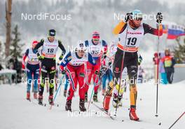 25.01.2015, Rybinsk, Russia (RUS): Tim Tscharnke (GER), Madshu, Swix, Alpina, Rottefella, Adidas followed by Hans Christer Holund (NOR), Madshus, KV+, Rottefella - FIS world cup cross-country, skiathlon men, Rybinsk (RUS). www.nordicfocus.com. © Laiho/NordicFocus. Every downloaded picture is fee-liable.