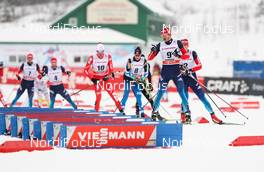25.01.2015, Rybinsk, Russia (RUS): Stanislav Volzhentsev (RUS), Fischer, Swix, Adidas leading in the ski change - FIS world cup cross-country, skiathlon men, Rybinsk (RUS). www.nordicfocus.com. © Laiho/NordicFocus. Every downloaded picture is fee-liable.