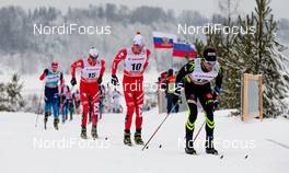 25.01.2015, Rybinsk, Russia (RUS): Jean Marc Gaillard (FRA), Salomon, Swix, One Way followed by Francesco de Fabiani (ITA), Fischer, Swix,  Rottefella and Dietmar Noeckler (ITA), Fischer, KV+, Rottefella - FIS world cup cross-country, skiathlon men, Rybinsk (RUS). www.nordicfocus.com. © Laiho/NordicFocus. Every downloaded picture is fee-liable.