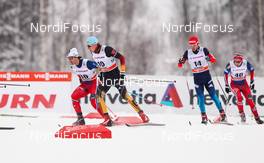 25.01.2015, Rybinsk, Russia (RUS): (l-r) Hans Christer Holund (NOR), Madshus, KV+, Rottefella, Tim Tscharnke (GER), Madshu, Swix, Alpina, Rottefella, Adidas, Ilia Chernousov (RUS), Rossignol, Swix, Adidas and Mathias Rundgreen (NOR) - FIS world cup cross-country, skiathlon men, Rybinsk (RUS). www.nordicfocus.com. © Laiho/NordicFocus. Every downloaded picture is fee-liable.