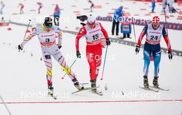 25.01.2015, Rybinsk, Russia (RUS): (l-r) Alex Harvey (CAN), Fischer, Swix, Salomon, One Way, Dietmar Noeckler (ITA), Fischer, KV+, Rottefella and Vladislav Skobelev (RUS), Fischer, Swix, Rottefella, Adidas - FIS world cup cross-country, skiathlon men, Rybinsk (RUS). www.nordicfocus.com. © Laiho/NordicFocus. Every downloaded picture is fee-liable.