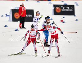 26.02.2015, Falun, Sweden (SWE): Marit Bjoergen (NOR), Astrid Uhrenholdt Jacobsen (NOR), (l-r)  - FIS nordic world ski championships, cross-country, 4x5km women, Falun (SWE). www.nordicfocus.com. © NordicFocus. Every downloaded picture is fee-liable.