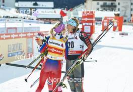 12.12.2015, Davos, Switzerland (SUI): Therese Johaug (NOR), Nicole Fessel (GER), (l-r)  - FIS world cup cross-country, 15km women, Davos (SUI). www.nordicfocus.com. © Felgenhauer/NordicFocus. Every downloaded picture is fee-liable.