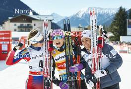 12.12.2015, Davos, Switzerland (SUI): Ingvild Flugstad Oestberg (NOR), Therese Johaug (NOR), Heidi Weng (NOR), (l-r)  - FIS world cup cross-country, 15km women, Davos (SUI). www.nordicfocus.com. © Felgenhauer/NordicFocus. Every downloaded picture is fee-liable.
