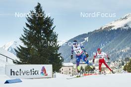 12.12.2015, Davos, Switzerland (SUI): Coraline Thomas Hugue (FRA), Masako Ishida (JPN), (l-r)  - FIS world cup cross-country, 15km women, Davos (SUI). www.nordicfocus.com. © Felgenhauer/NordicFocus. Every downloaded picture is fee-liable.