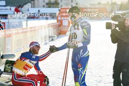 12.12.2015, Davos, Switzerland (SUI): Martin Johnsrud Sundby (NOR), Maurice Manificat (FRA), (l-r)  - FIS world cup cross-country, 30km men, Davos (SUI). www.nordicfocus.com. © Felgenhauer/NordicFocus. Every downloaded picture is fee-liable.