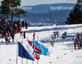 14.03.2015, Oslo, Norway (NOR): the top group passes the stadium - FIS world cup nordic combined, individual gundersen HS134/10km, Oslo (NOR). www.nordicfocus.com. © Felgenhauer/NordicFocus. Every downloaded picture is fee-liable.