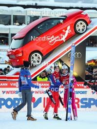 01.01.2015, Garmisch, Germany (GER): (l-r) Gregor Schlierenzauer (AUT), Fischer, Anders Fannemel (NOR) and Anders Jacobsen (NOR) - FIS world cup ski jumping, four hills tournament, individual HS140, Garmisch (GER). www.nordicfocus.com. © Laiho/NordicFocus. Every downloaded picture is fee-liable.